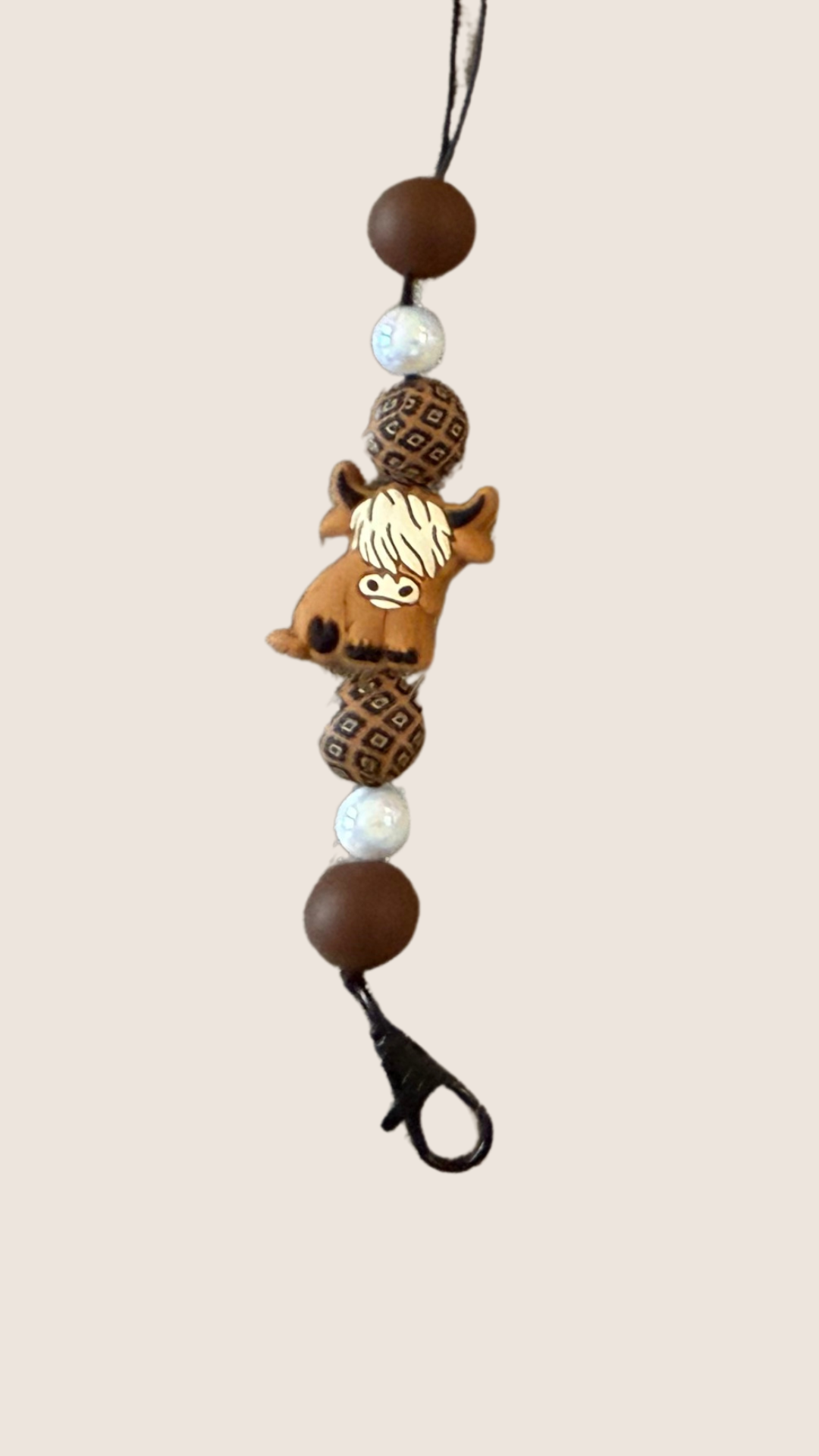 HIGHLAND COW FRESHIE HANGER WITH BROWN AND BLACK BEAD